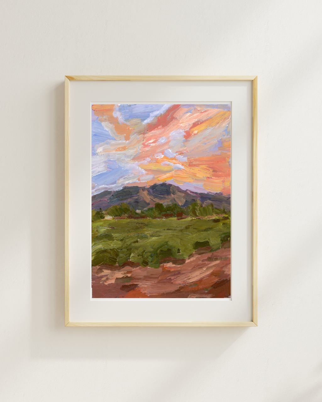Golden Hour landscape print in a light wood frame