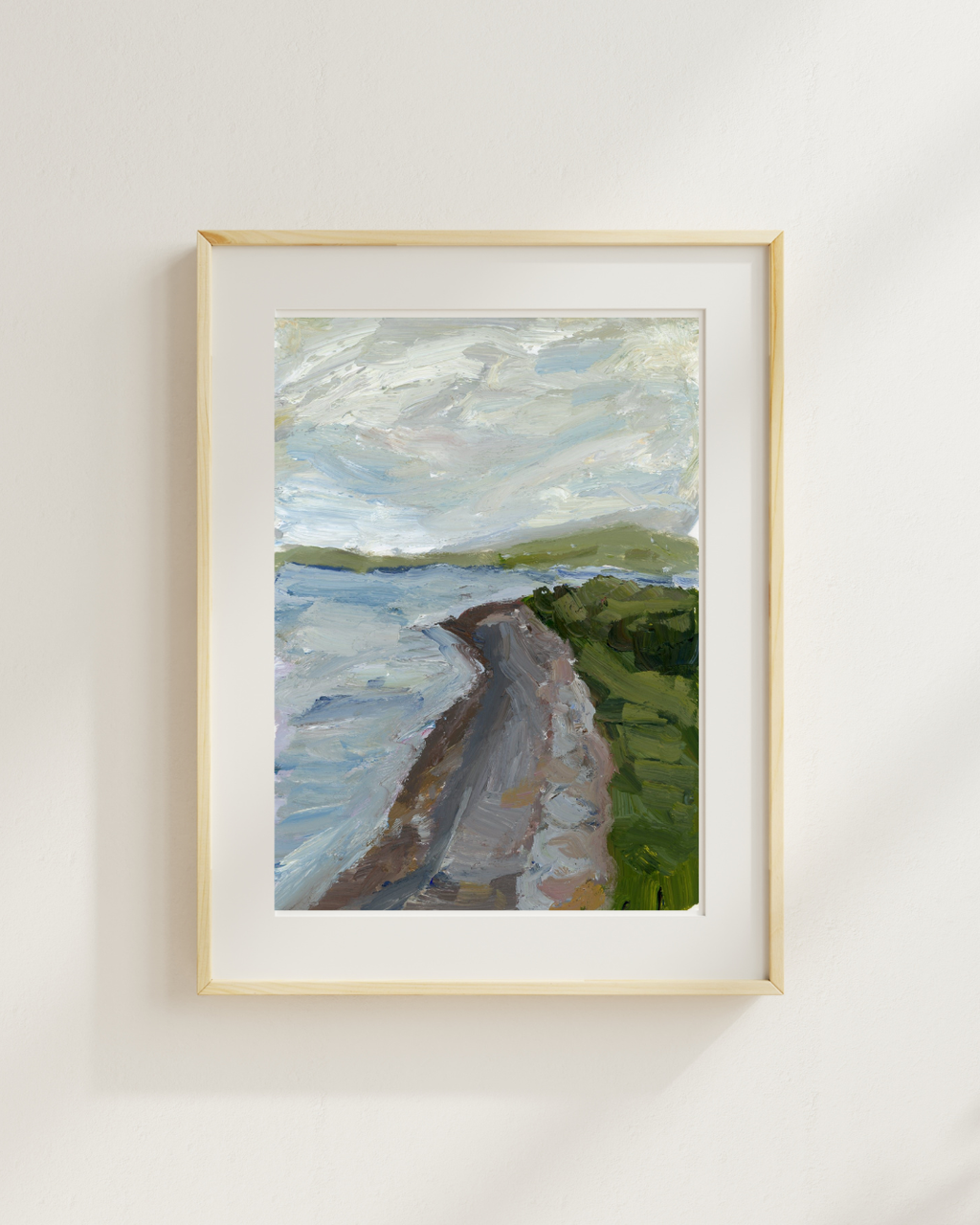 Ireland Shore landscape print displayed in a light wood frame