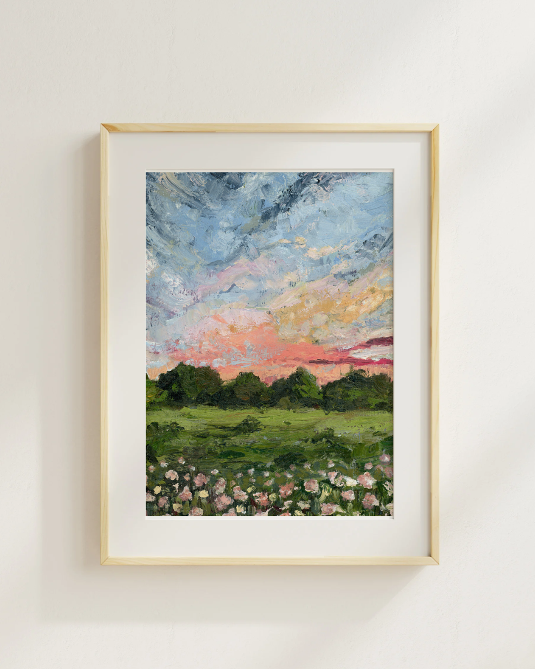 Sunset Fields landscape print with wildflowers in a light wood frame